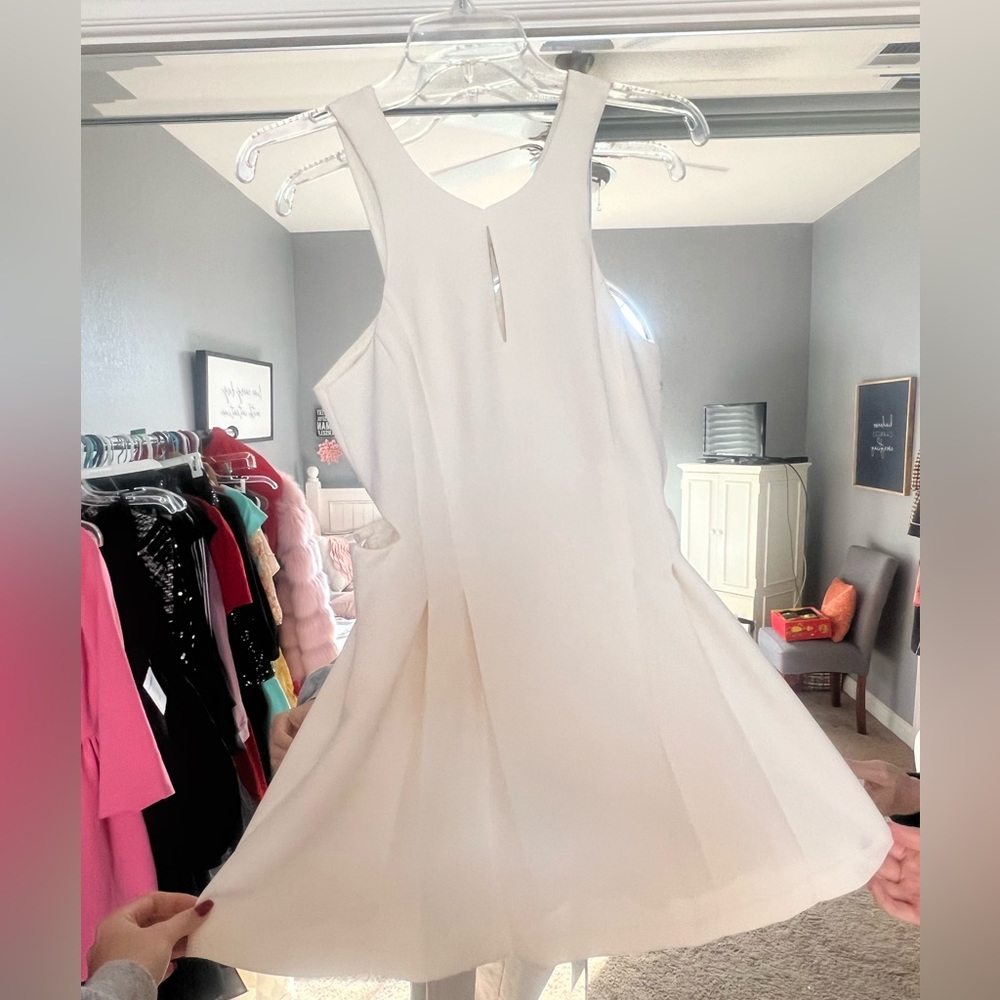 BCBG White mini cutout dress!